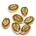 Detailed view of colorful painted natural cowrie shell beads with ethnic tribal patterns - Size 5 / 20 Pieces Set