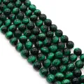 Macro detail of green tiger eye beads showing smooth polish and silk luster texture - Green (No. 8)