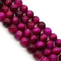Macro shot of polished rose pink tiger eye round beads for DIY jewelry making - 4mm (10g) / Rose Red (No.7)