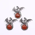 Detailed trio of vintage silver Viking dragon pendants inlaid with brown goldstone gems - Gold Sandstone