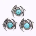 Detailed view of silver dragon pendant set with turquoise stone on white background - Blue Turquoise