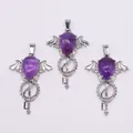 Detailed view of amethyst style angel wing pendants with silver key design elements - Purple Crystal