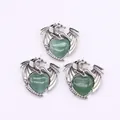 Detailed view of silver dragon wrapping around heart-shaped green aventurine stone pendants - Pendant Only (Without Chain) / Green Aventurine Dragon Pendant