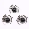 Three vintage silver dragon wing pendants with black onyx stone centers in gothic style - Black Agate