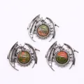 Set of dragon-wrapped unakite gemstone pendants with detailed silver metal wings - Unakite