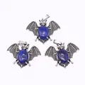 Retro vleermuis hanger met ovale blauwe lapis lazuli en zilveren vleugels - Verbeterde Lapislazuli