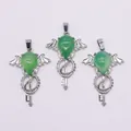 Three angel wing key pendants featuring green teardrop stones in silver finish - Synthetic Light Green Jade