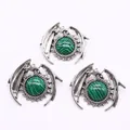 Gothic silver dragon pendant with green malachite stone in a vintage mystical design - Malachite