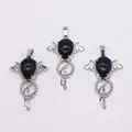 Three gothic silver key pendants with blue sandstone teardrop gems and bat wing details - Blue Sandstone