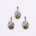 Unakite teardrop pendant featuring a silver-plated peacock feather design set - Unakite