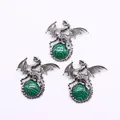 Viking dragon pendant in vintage silver finish holding a green malachite stone ball - Malachite