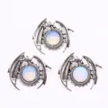 Vintage silver dragon pendant featuring a centered round opal stone with wings spread - Opal