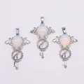 Gothic silver-plated angel wing pendant with teardrop opal stone and vintage key design - Opal