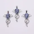 Three gothic silver metal key pendants featuring blue sodalite stones and bat wings - Blue Spot Stone