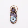 Detail of copper wrapped pendant featuring purple amethysts and a blue agate evil eye stone - Red Copper Amethyst and Blue Agate (No. 4)