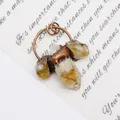 Macro shot of natural citrine crystal pendant wrapped in vintage copper wire detailing - Pendant Only (Without Chain) / Citrine