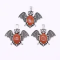 Drie zilveren vleermuis hangers met ovale oranjebruine goudsteen kristallen voor DIY - Goudzandsteen