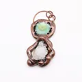 Detailed view of handmade bronze pendant featuring green gemstone and white quartz crystal - Green Textured Gemstone And White Druzy (No. 2)