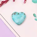 Cuenta de turquesa pulida en forma de corazón con vetas naturales para creación de joyas - Malla Cyan Negra (No.27)