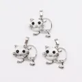 Colgante de gato con piedra turquesa blanca natural y chapado en metal plateado - Howlita