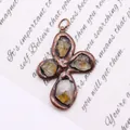 Macro detail of natural crystal stone pendant with vintage bronze petal-shaped metal frame - Style 1 (Citrine)