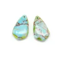 Macro shot of polished teardrop turquoise pendants with intricate mineral vein textures - Light Blue Brown Matrix Style (4)