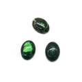 Gros plan de pierres de turquoise ovales polies avec des textures minérales naturelles - 13x18mm / Tons Vert Foncé (N° 12)