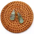 Pair of waterdrop-shaped green fluorite stones for DIY jewelry making on woven mat - Green Fluorite