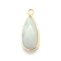 Macro view of teardrop natural stone pendant with gold faceted metal edge and ring - Light Gray Style (1)