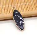 Colgante marquise de piedra negra con vetas blancas y borde dorado para joyería DIY - Howlita de Línea Negra