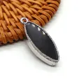 Ciondolo marquise in pietra nera con bordo strutturato argentato e anello di sospensione - Taglio marquise / Ematite