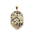 Close-up of hexagonal stone pendant with natural spots and gold plating connector - Dalmatian Jasper