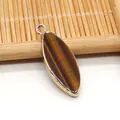 Colgante ojo de tigre forma marquesa con borde chapado en oro y textura natural - Ojo de tigre