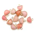 Macro detail of faceted semi-circular opal pendants with gold-plated edges for DIY jewelry - Pink Jade