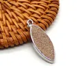 Pendente marquise in pietra naturale con bordo argentato e inserto marrone testurizzato - Taglio marquise / Diaspro
