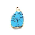 Irregular turquoise pendant with rose gold plated frame and black veined texture - Blue Turquoise