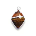 Polished tiger eye stone pendant in a rhombus shape with silver metal framing - Tiger's Eye
