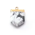Sword-shaped white howlite pendant with gold plating and natural marble texture - Howlite