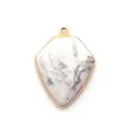 Shield shape picture stone pendant with natural marble pattern and gold plated edge - Howlite