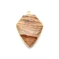 Shield-shaped natural picture jasper stone pendant with elegant gold plated metal edges - Jasper