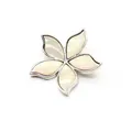 Macro view of white shell inlay flower pendant brooch with iridescent silver finish - White Shell
