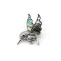 Detailed macro shot of vintage silver hummingbird brooch inlaid with iridescent abalone shell - Abalone Shell Wing (No.2)