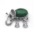 Detail of elephant brooch with green malachite stone and antique silver finish - 36x43mm / Malachite