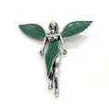 Detailed view of silver angel brooch with green striped shell inlay on white background - Blue Turquoise Angel Style / Blue Turquoise