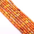 Macro detail van oranje keizerlijke steen cilinderkralen met natuurlijke texturen - Heloranje/Donkerrood Marmer (Nr.20)