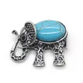 Vintage elephant brooch in silver finish featuring an oval turquoise stone inlay - 36x43mm / Blue Turquoise