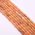 Gros plan de perles de pierre impériale orange poli pour la création de bijoux DIY - 5x12mm (16g) / Rouge Orangé (N° 11)