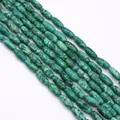 Vista macro di perle ovali in pietra d'imperatore turchese con trama marmorea per gioielli - 5x12mm (16g) / Verde Smeraldo (N. 1)