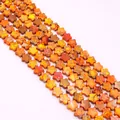 Primer plano macro de piedras naturales coloridas en forma de estrella con texturas minerales - Degradado Naranja Amarillo Rojo (No. 13)