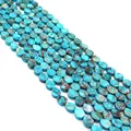 Gros plan de perles gouttes en pierre empereur turquoise pour la création de bijoux - Bleu-Cyan & Marron Doré Motif de Filet (N° 14)